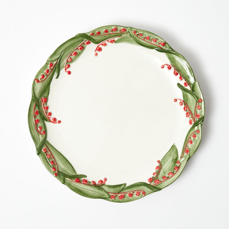 Elevate your holiday feasts with the Red Berry Dinner Plate, a stunning addition that captures the essence of the season with vibrant red berry motifs.