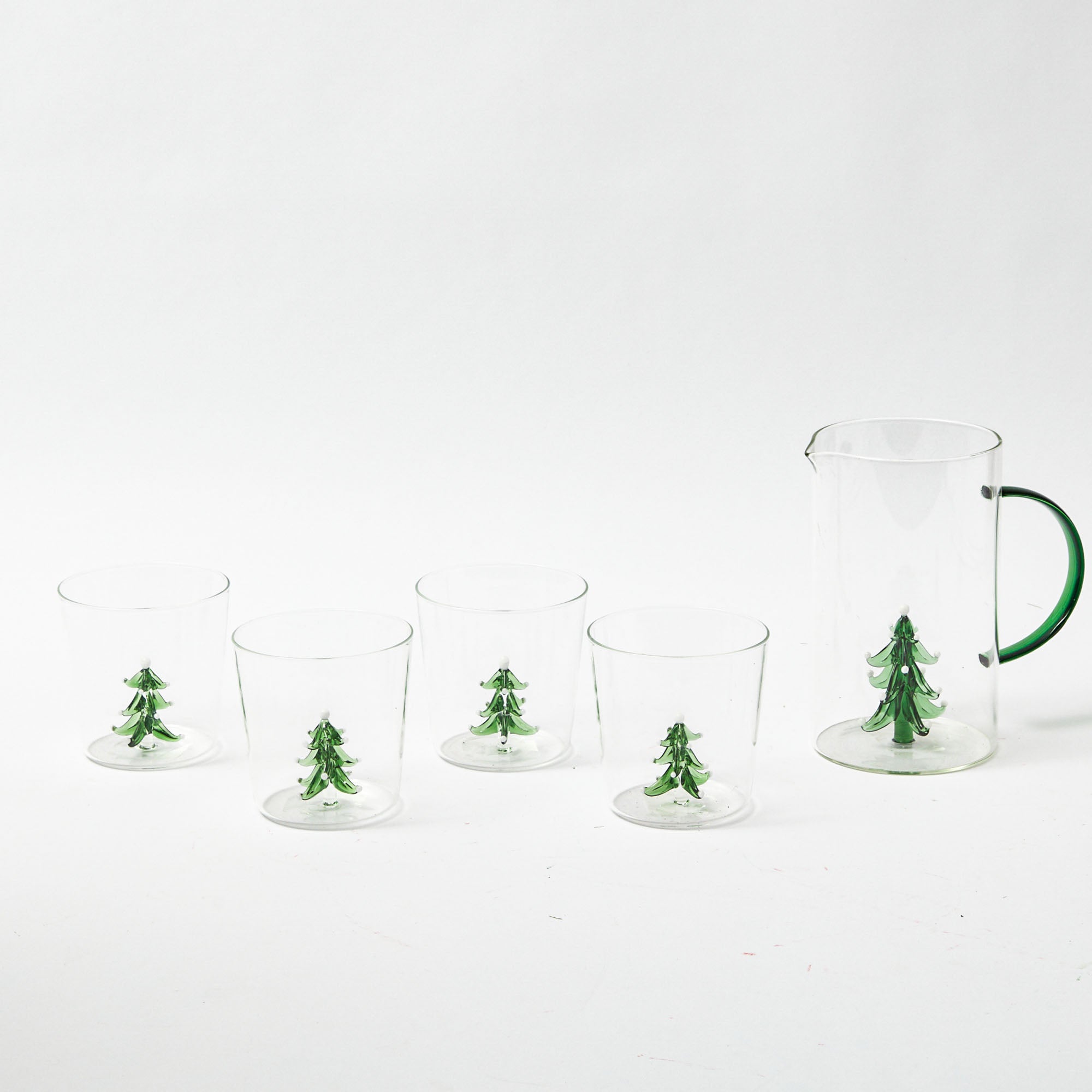 This festive Christmas Tree Jug and Glasses Set adds a touch of holiday cheer to your table.
