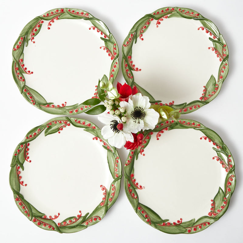 Embrace the spirit of the season with the Red Berry Dinner Plate, a beautiful addition that adds a festive touch to your holiday celebrations with its vibrant red berry designs.