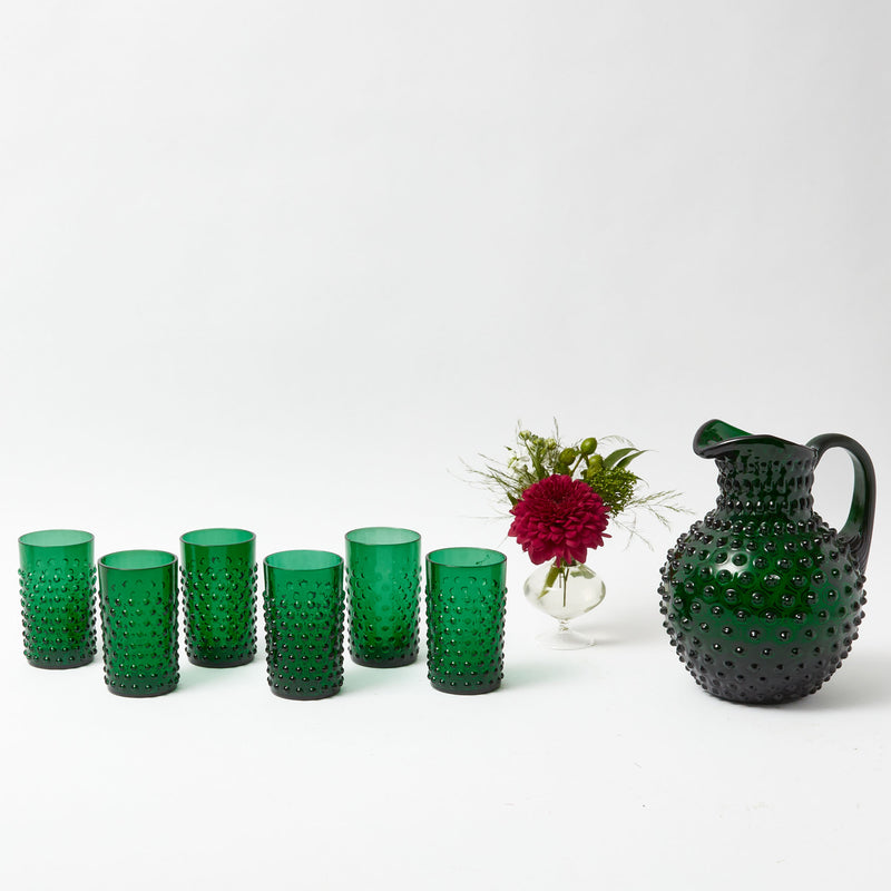 Elevate your Christmas table with our 12-Piece Emerald Green Hobnail Glasses & Jug Set - a stunning addition to your holiday gatherings.