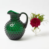 Make every Christmas gathering special with the Emerald Green Hobnail Jug - a delightful addition to your holiday table, serving your preferred holiday drinks with elegance.