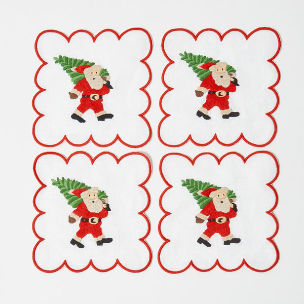 Elevate your holiday gatherings with Scalloped White Embroidered Father Christmas Cocktail Napkins (Set of 4).