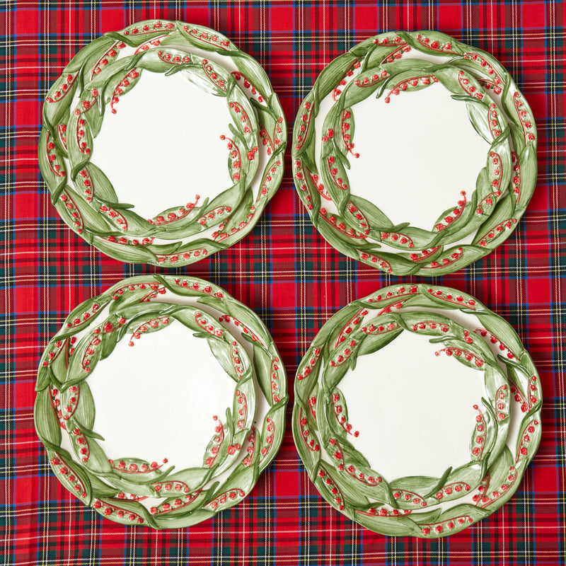 Share the holiday spirit with loved ones as you gather around the Red Berry Dinner Plate, an exquisite piece that enhances your festive occasions with the magic of ripe red berries.