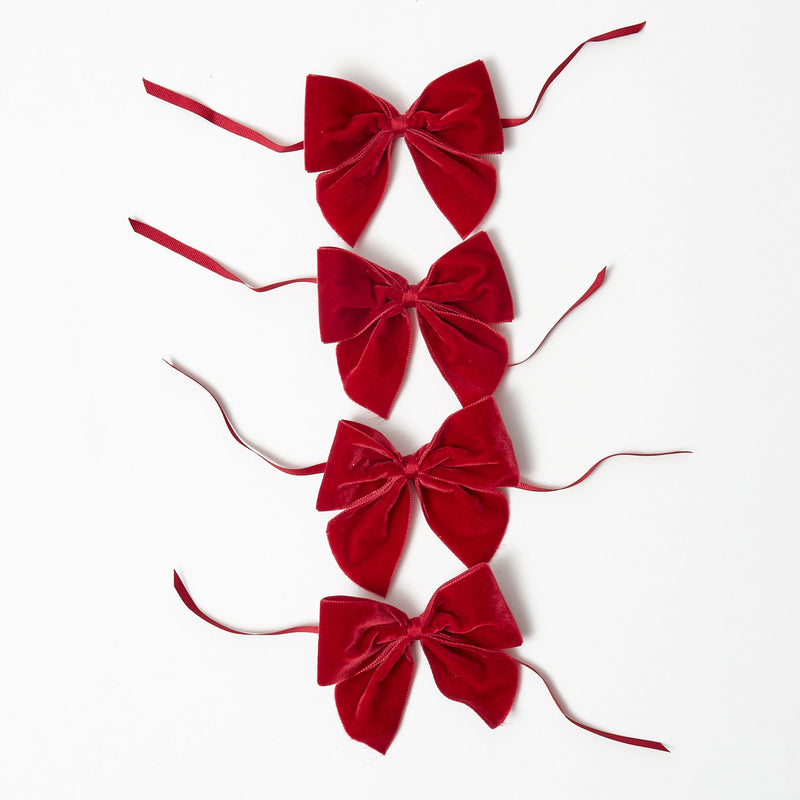 Wrap your napkins in luxury with our Ruby Red Velvet Napkin Bows, perfect for a touch of sophistication.