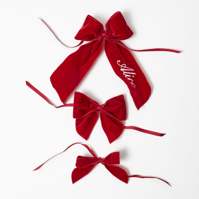 Elevate your dining experiences with our Ruby Red Velvet Napkin Bows - a classic touch of grace.