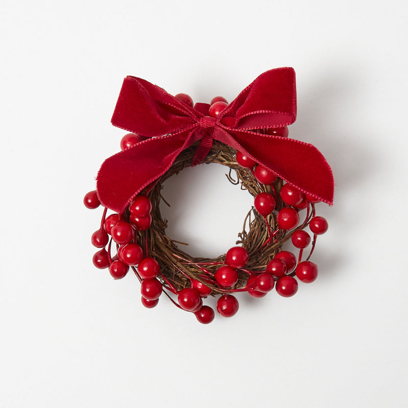 Add a traditional and welcoming touch to your holiday decor with the Red Berry Wreaths Set, a quartet of wreaths featuring vibrant red berries that symbolize the joy of the season.