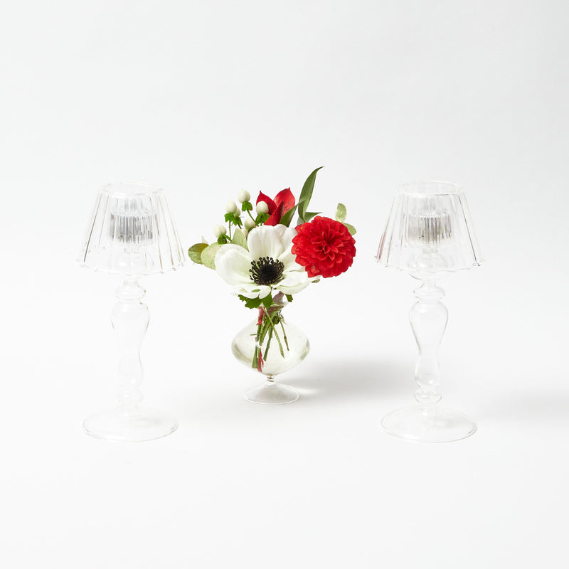 Add a touch of Christmas elegance to your holiday table with the Glass Lantern Tea Light Holder Pair, perfect for creating a coordinated and inviting atmosphere.