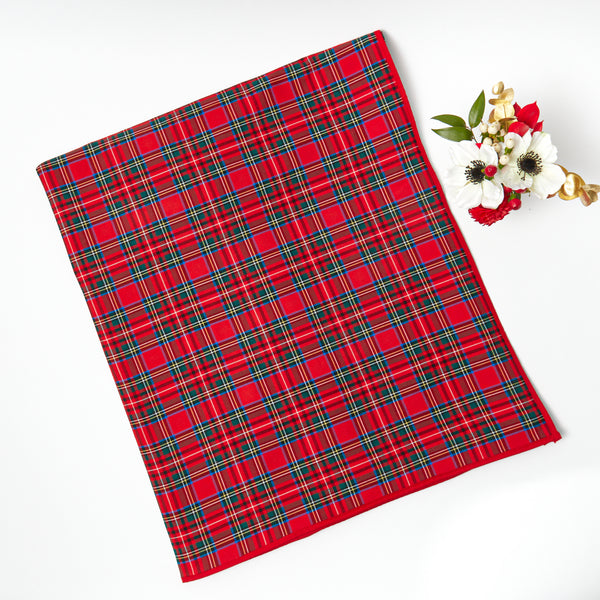 Embrace the timeless charm of the holidays with the Bonnie Tartan Tablecloth, a festive addition that brings a classic touch to your Christmas table.
