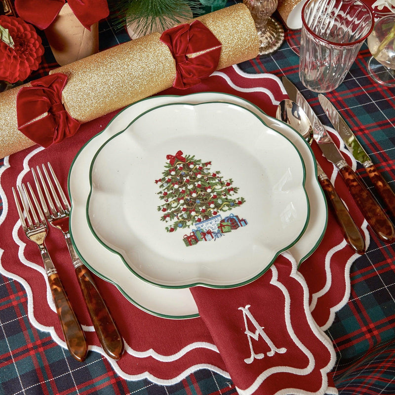 Elevate your holiday table setting with the Katherine Berry Red Placemats & Napkins Set - a set of four that adds a touch of festive elegance to your Christmas dining experience.