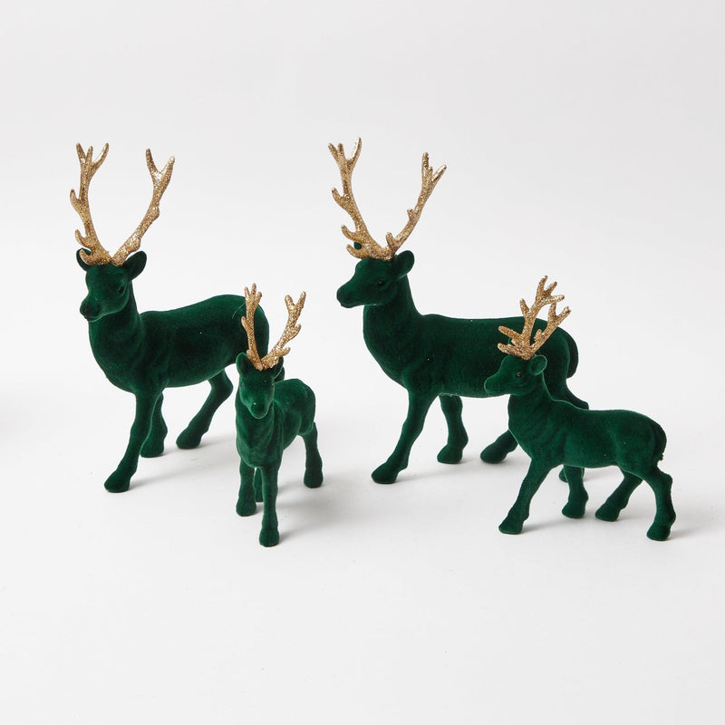 Celebrate the beauty of the season with the Large Forest Green Flocked Reindeer Pair, a must-have for infusing your decor with the warmth and festive spirit of Christmas in the heart of the forest.