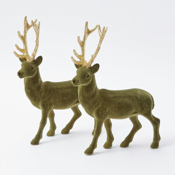 Elevate your holiday decor with the Large Olive Green Flocked Reindeer Pair - a charming duo that adds a touch of woodland magic to your Christmas festivities.