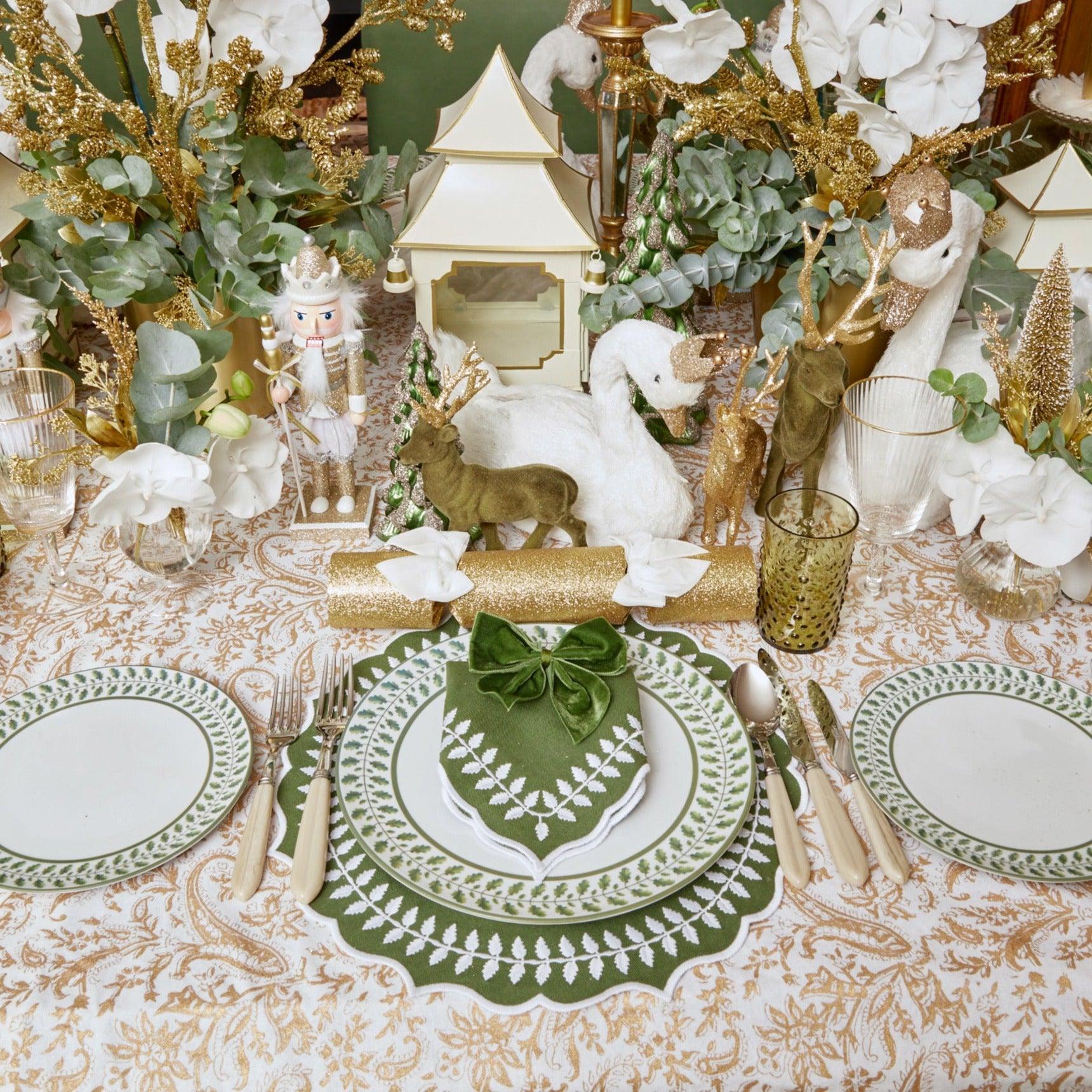 Add a touch of rustic elegance to your Christmas celebrations with the Large Olive Green Flocked Reindeer Pair, perfect for creating a coordinated and inviting atmosphere reminiscent of a forest holiday.