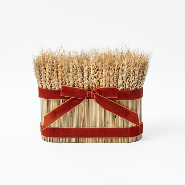 Wheat sheaf tied with a luxurious velvet bow.
