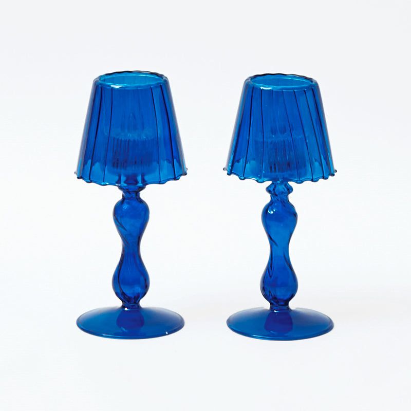 Set of two midnight blue glass lanterns, each designed for tea light candles at 18 cm.