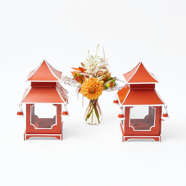 Add a touch of warmth to your ambiance with the Burnt Orange Mini Pagoda Lantern Pair, perfect for creating a cozy and inviting atmosphere.