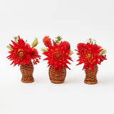 Set of 3 mini burnt rattan vases for delicate floral arrangements.