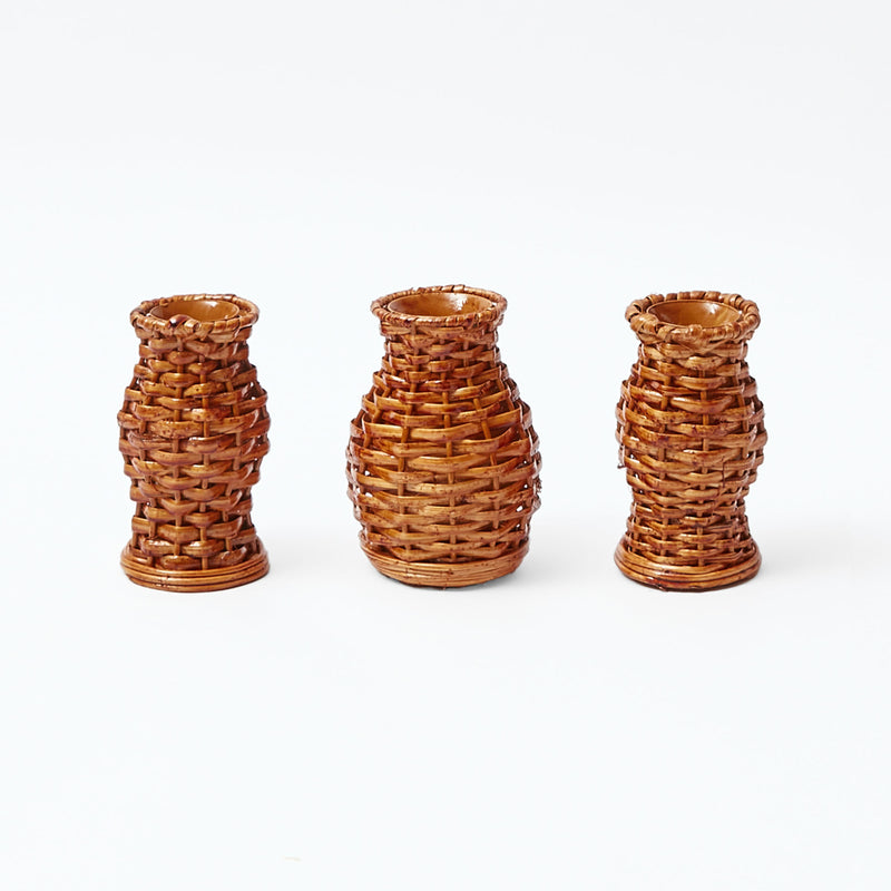 Trio of burnt rattan vases, designed for charming small-scale decor.