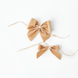 Crafted for elegance: Set of 4 Oat Velvet Napkin Bows.