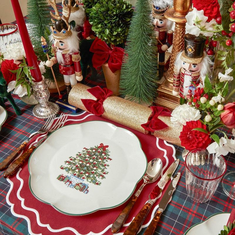 Add a touch of holiday joy to your Christmas celebrations with the Mrs. Alice Christmas Tree Dinner Plate, perfect for creating a coordinated and inviting atmosphere.