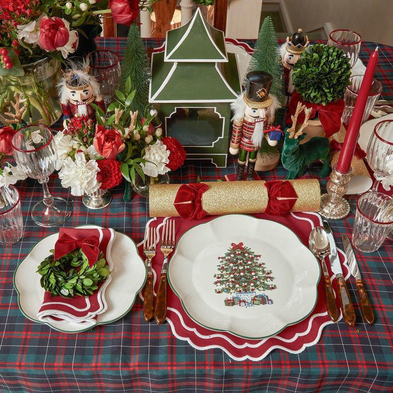 Elevate your Christmas events with the whimsical and enchanting Mrs. Alice Christmas Tree Dinner Plate - a simple yet stylish statement of holiday delight with a festive twist.