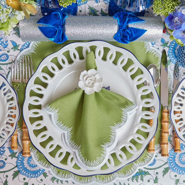 Add a refreshing pop of color to your table with Apple Green Isabella Round Placemats.