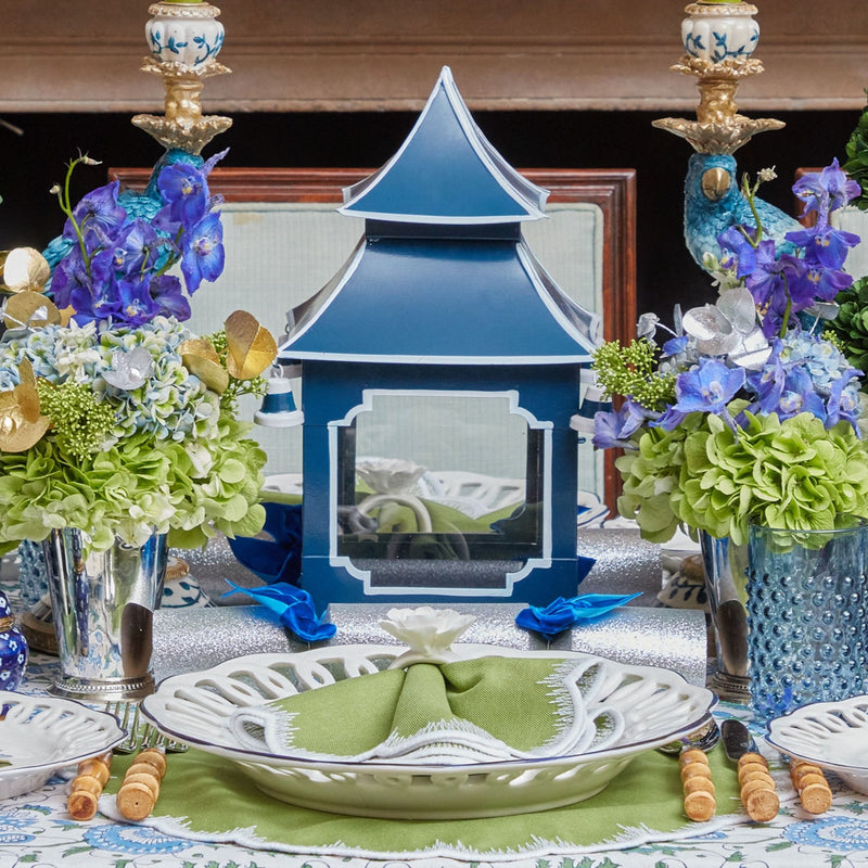 Impress your guests with the delightful charm of the Midnight Blue Pagoda Lantern, a lantern that adds a touch of sophistication and a calming midnight blue hue to any interior setting.