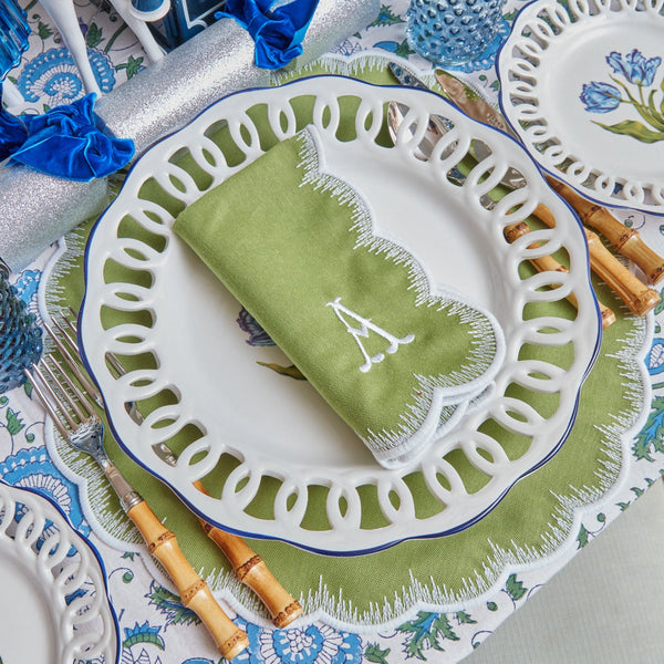 Elevate your dining experience with Apple Green Isabella Round Placemats & Napkins – a delightful set for any occasion.