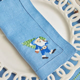 Enjoy the magic of the season with Blue Hand Embroidered Father Christmas Napkins.