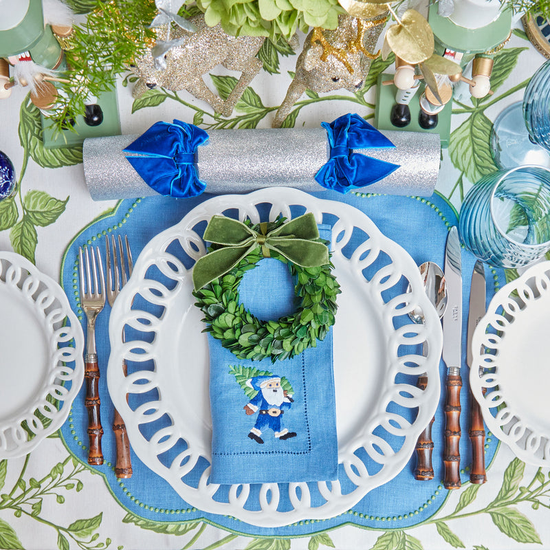 Add elegance and charm to your holiday gatherings with these embroidered napkins.