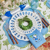 Blue Hand Embroidered Father Christmas Napkins bring holiday cheer to your home.
