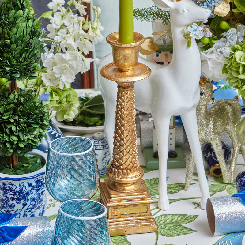 Enhance your ambiance with the graceful presence of the Gold Allegra Candle Holder Pair, perfect for showcasing your favorite candles in a stylish and elegant way.