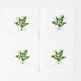 Enhance your table setting with the timeless charm of Lily of the Valley White Linen Cocktail Napkins.
