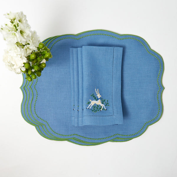 Create a stunning tablescape with Eloise Blue & Green Placemats & Prancing Deer Napkins Set, a delightful choice for festive dining.