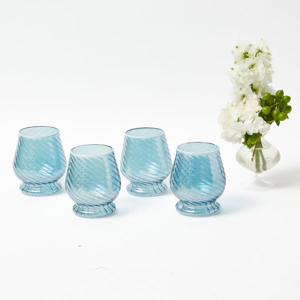 Elevate your hydration routine with the Camille Blue Water Glasses, a set of four glasses that infuse your sipping moments with timeless elegance and a captivating blue tint.