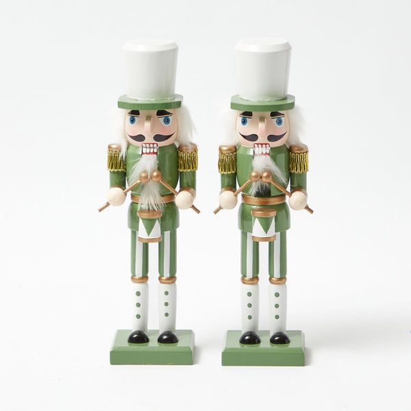 Add a touch of elegance with these Soft Green Nutcracker figurines.
