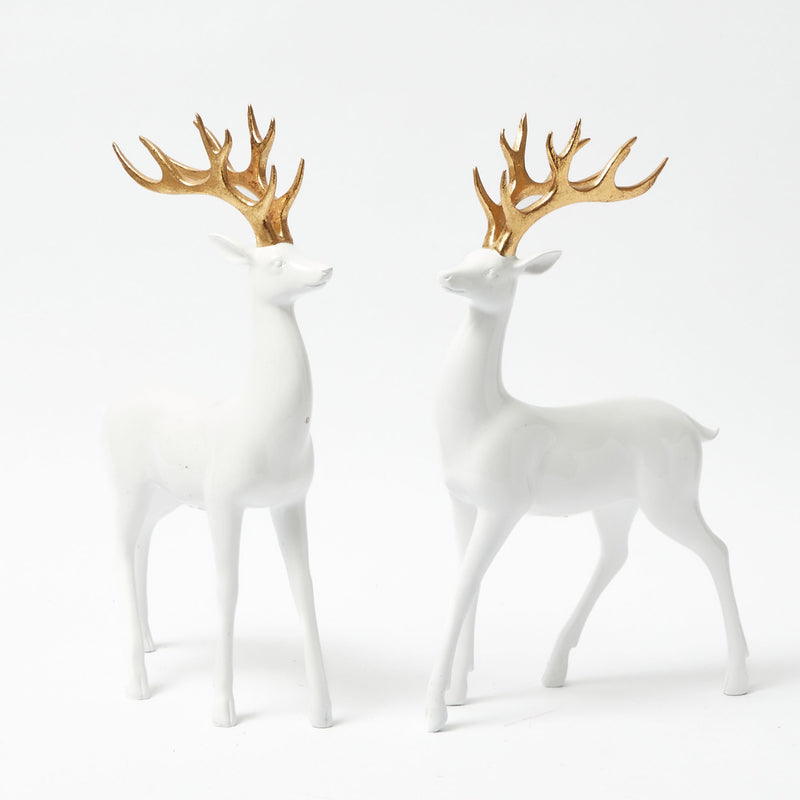 Create a festive and enchanting ambiance with these Large White Reindeer and their shimmering Gold Antlers.