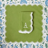Experience the joy of beautifully folded Apple Green Isabella Napkins (Set of 4) at your next meal.