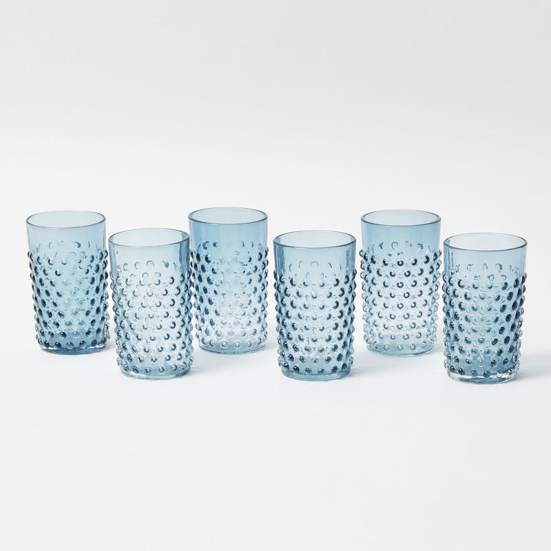 Add a touch of timeless style to your glassware with the Hobnail Navy Glasses.
