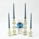 Enhance your home with the calming charm of our Dusty Blue Candles, adding a touch of serenity to any room.