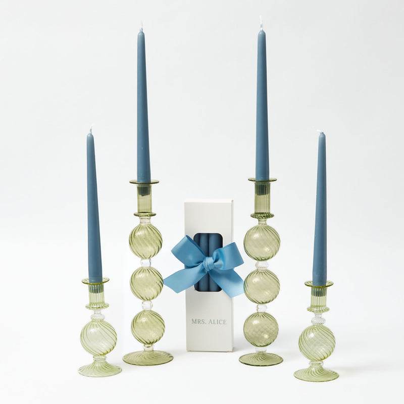 Enhance your home with the calming charm of our Dusty Blue Candles, adding a touch of serenity to any room.