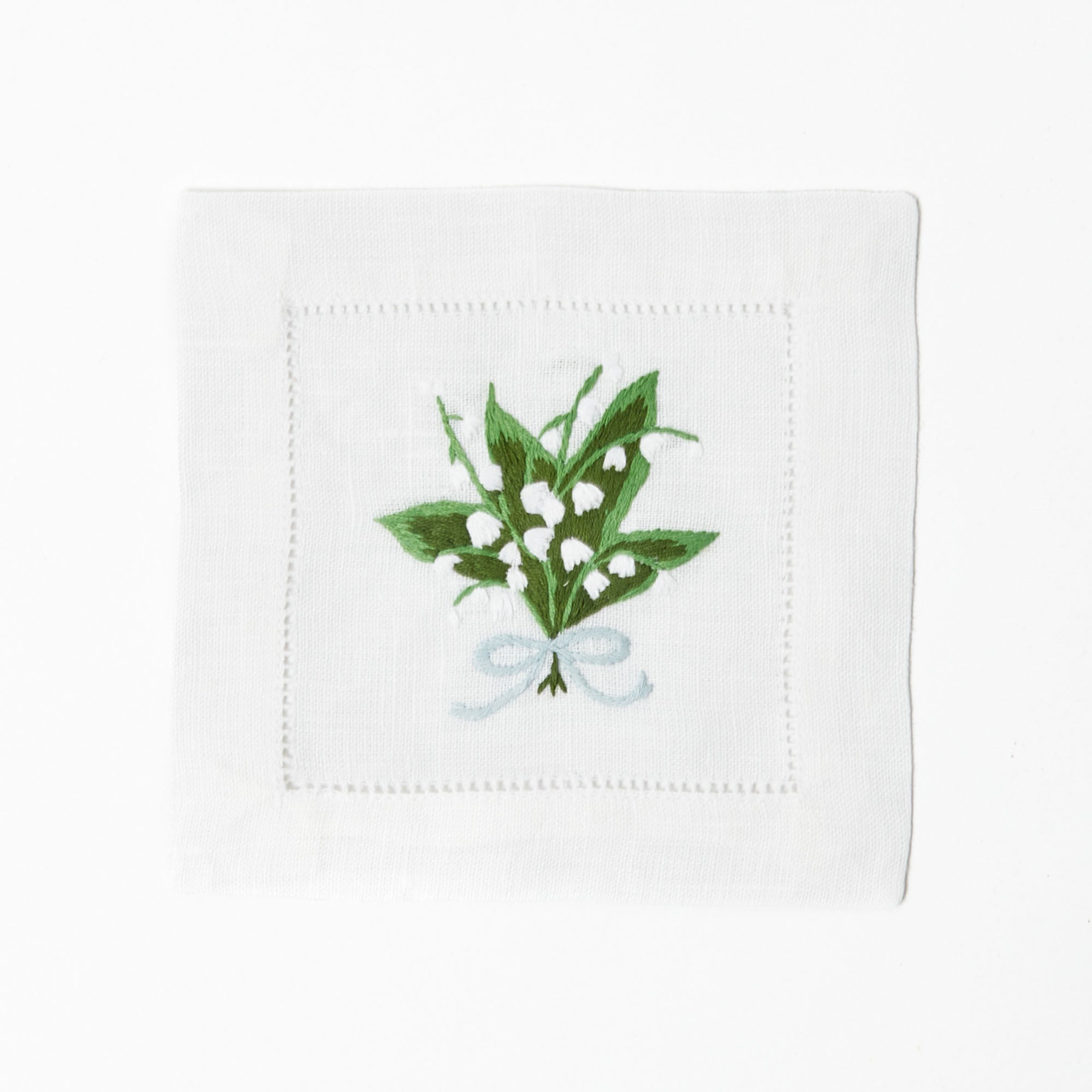 Make a sophisticated statement with the subtle grace of Lily of the Valley Linen Napkins (Set of 4).