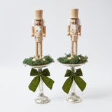 Add a touch of yuletide nostalgia to your Christmas decor with the Natural Wood Nutcracker Pair - a delightful addition to create a warm and cozy holiday atmosphere, evoking cherished holiday memories.