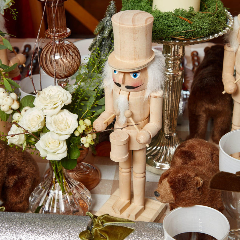 Illuminate your Christmas decor with the timeless and enchanting beauty of the Natural Wood Nutcracker Pair, designed to bring the magic of the holiday season to your festive table.