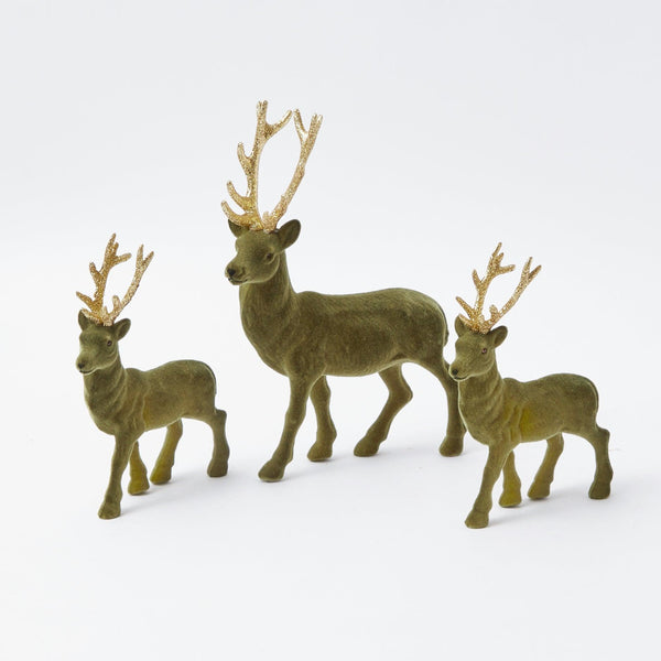 Add a touch of woodland charm to your holiday decor with the Olive Green Flocked Reindeer Family - a delightful addition that captures the spirit of Christmas and brings a rustic elegance to your home.
