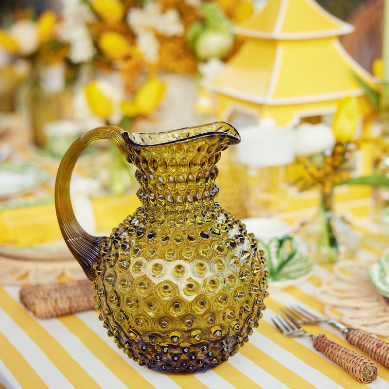 Celebrate the beauty of olive green drinkware with our Olive Green Hobnail Jug, a must-have for any vintage gathering.