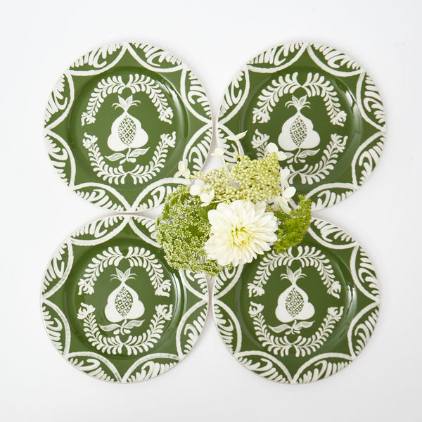 Set of 4 starter plates featuring delightful olive and pomegranate designs.