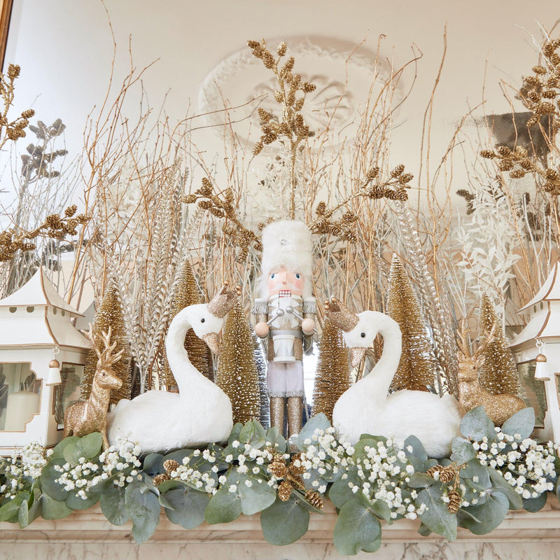 Make every space special with the Pair of Olivia Swans - a delightful addition to your home decor.