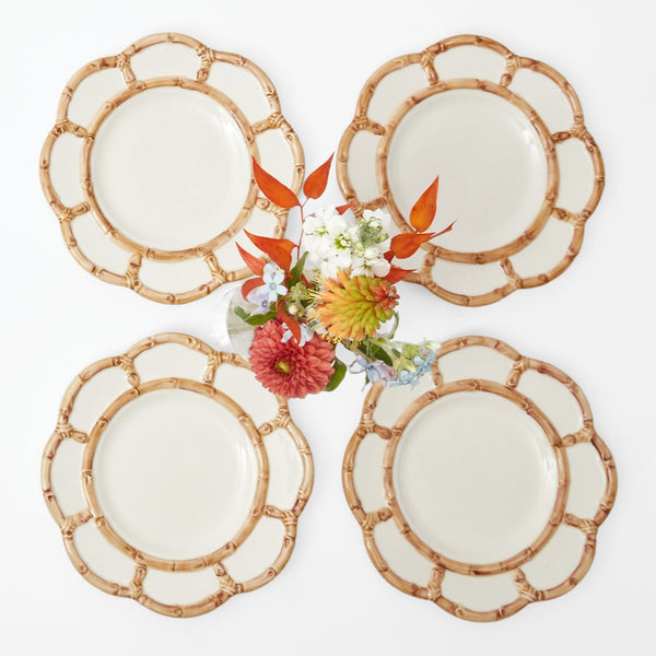 Set of 4 Petal Bamboo Starter Plates for elegant dining.