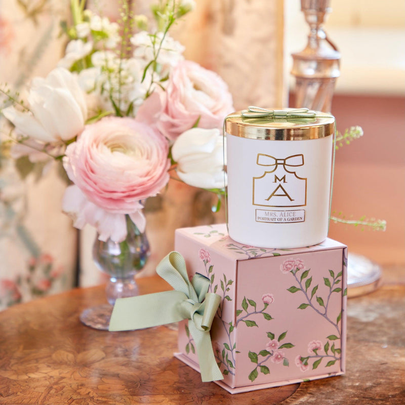 Embrace the night in elegance with the Bonne Nuit Pink Giftscape, including a Pink Sleeveless Nightdress, a luxurious Rose Petal Scented Candle, and ten exquisite Pink Chintz Pochettes you can personalize.