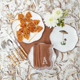 Add elegance to your table with these Caramel Linen Napkins.